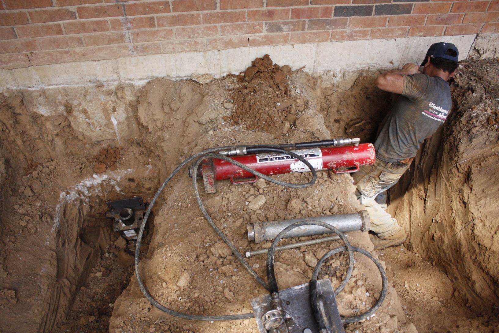 Foundation Repair Push Pier Install in Kirkwood, MO Pier Setup for