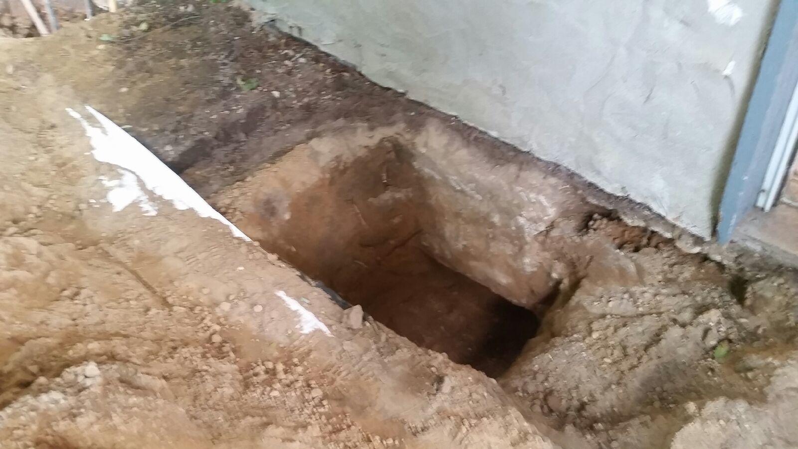 Foundation Repair Centerport, NY Home's Foundation is Stabilized Holes