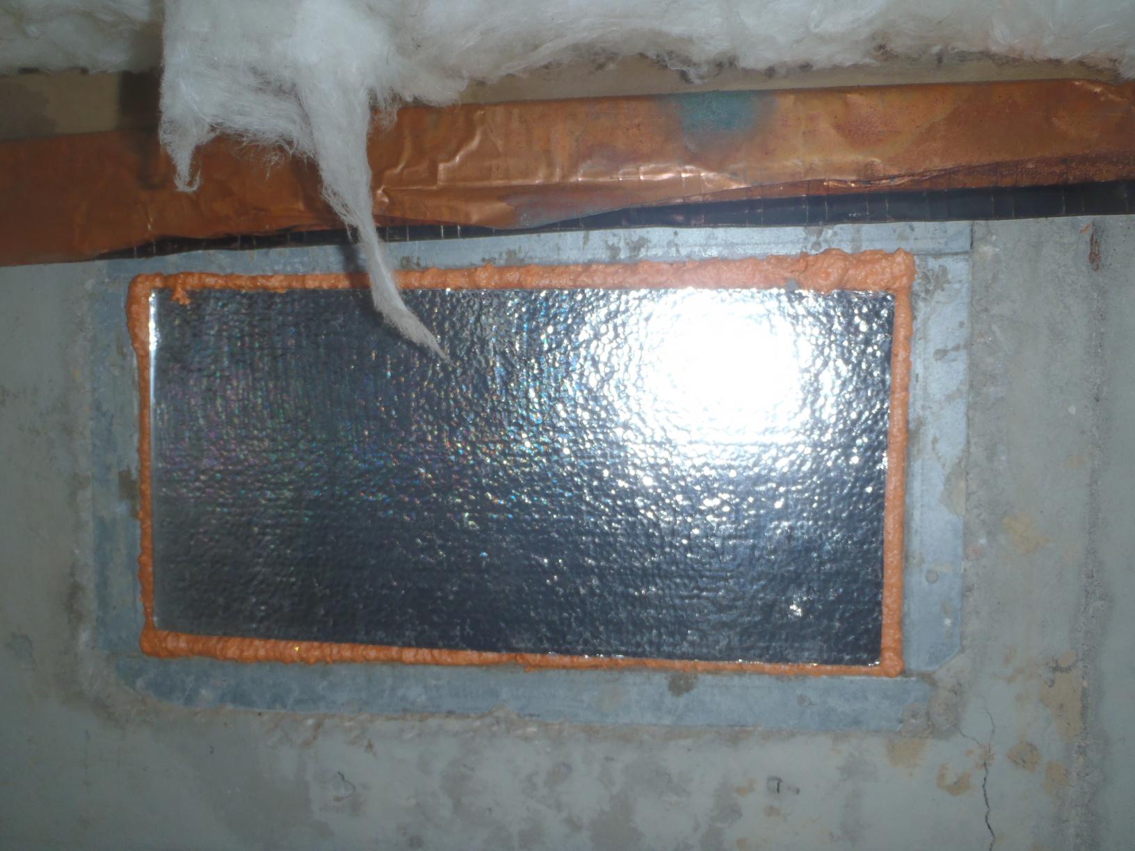 Home Insulation Services Installing SilverGlo in a Crawl Space in