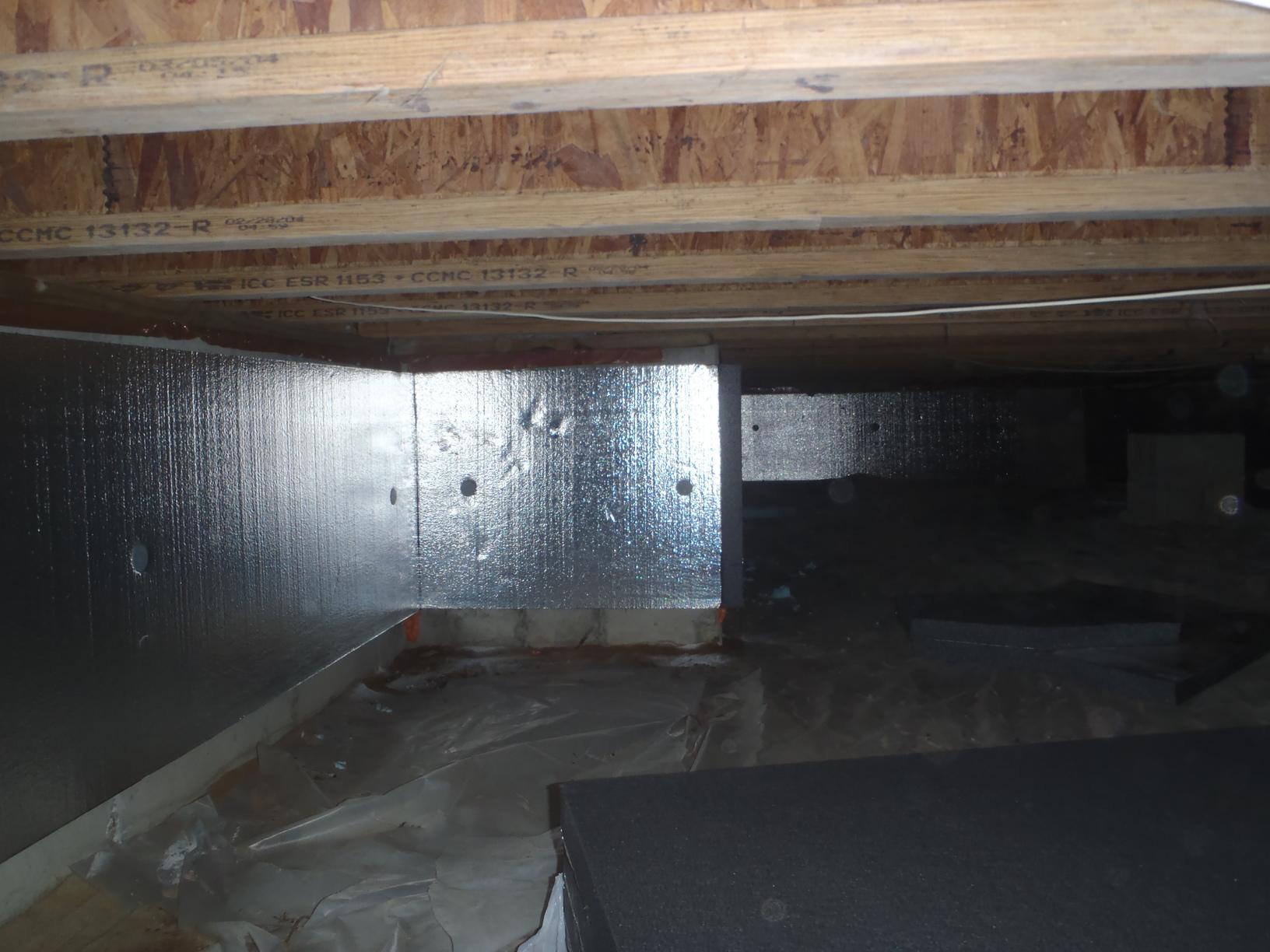 Home Insulation Services Installing SilverGlo in a Crawl Space in
