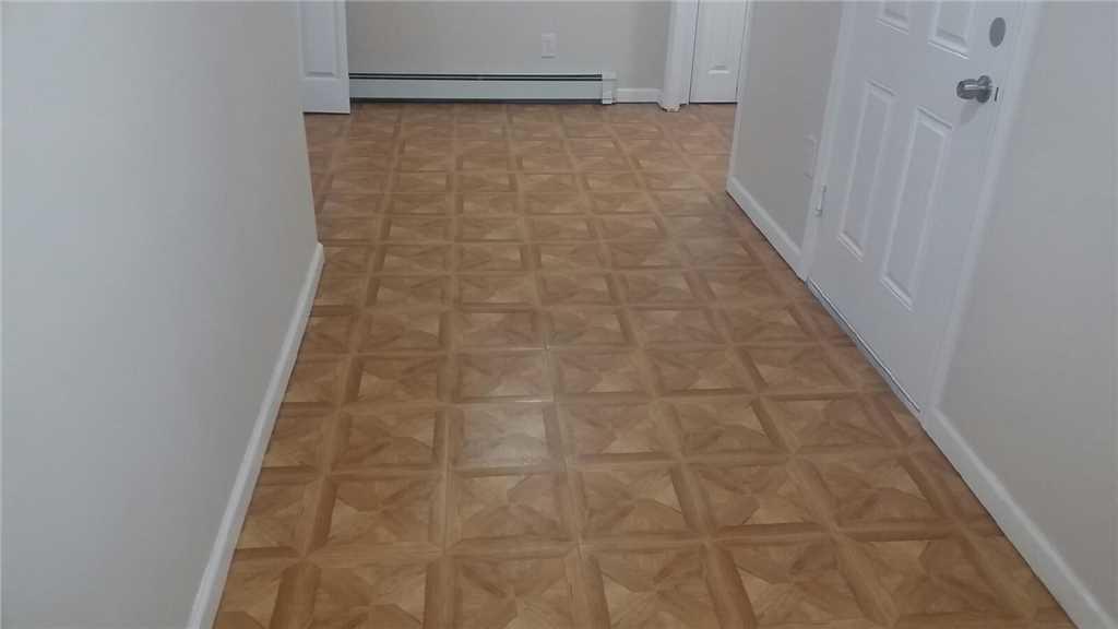 Cold Floor Solution for a Wantagh, NY Basement Hallway with new floording