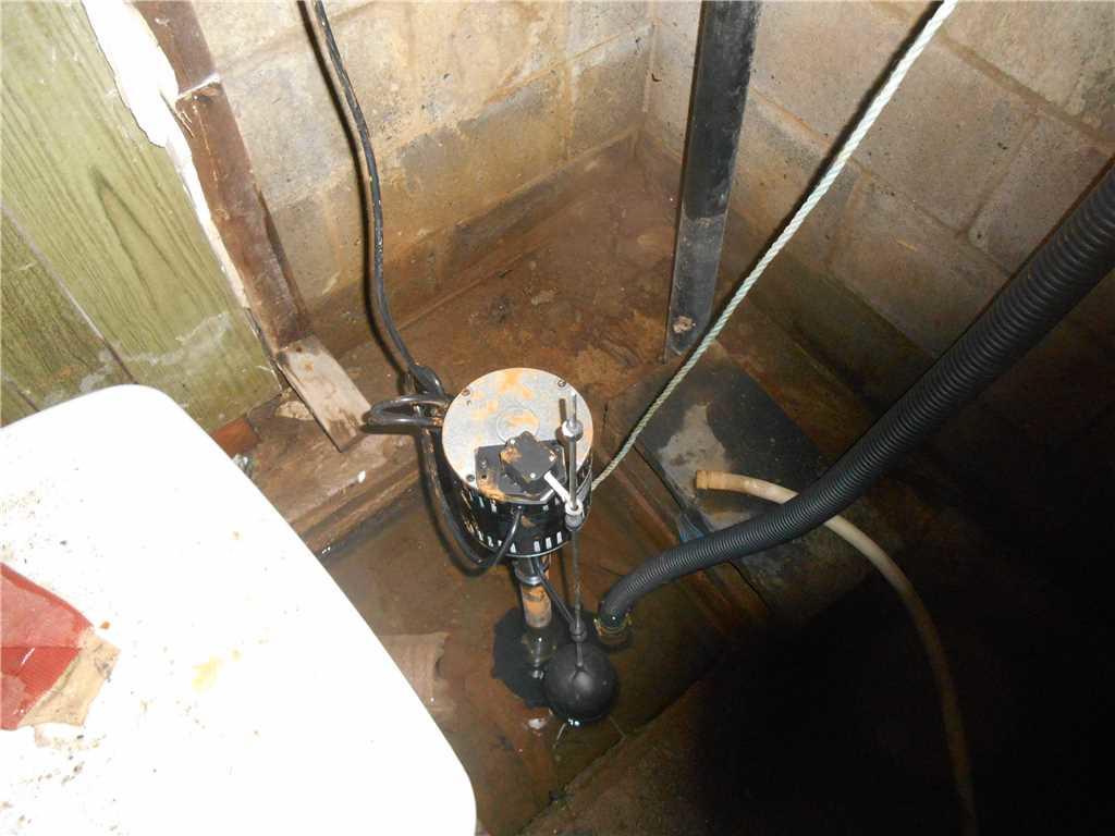 Sump Pump Installation Sump pump systems in Boisbriand, Quebec Old