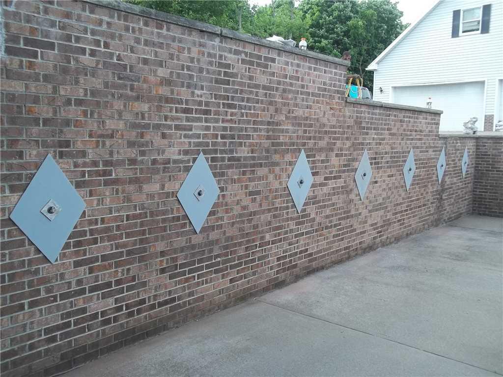 Foundation Repair Retaining Wall Bowing in Fairmont WV Wall is Now
