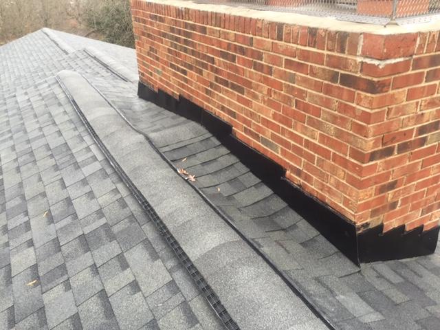 Roof Replacement Dallas Nc New Roof And Gutter Project After Photo Of The Chimney With Cricket
