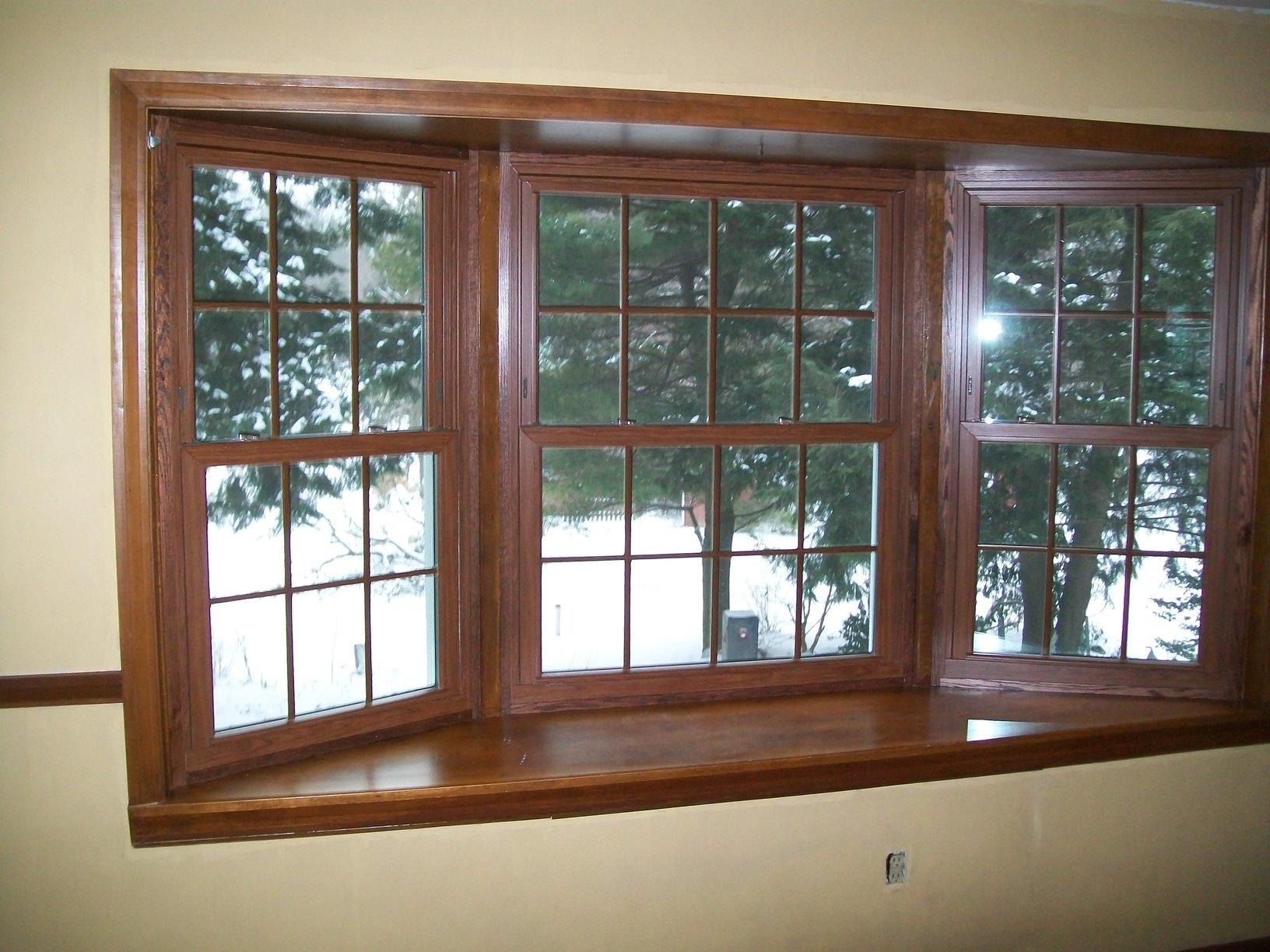 Energy Swing Windows Replacement Windows New woodgrain windows installed into existing bay