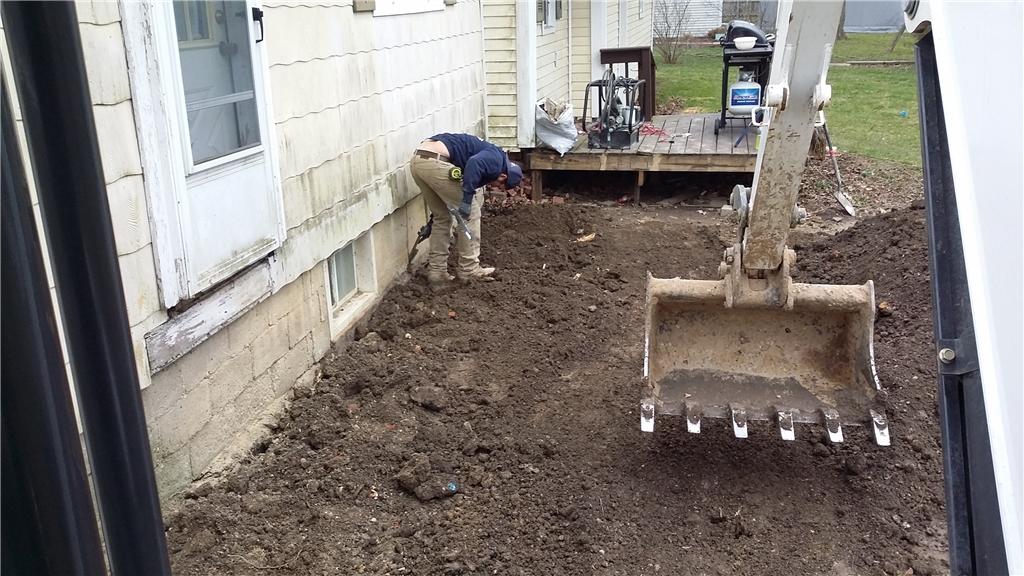 Foundation Repair Stabilizing a Slanted Home in Reading, MI Soil Excavation Before Pier