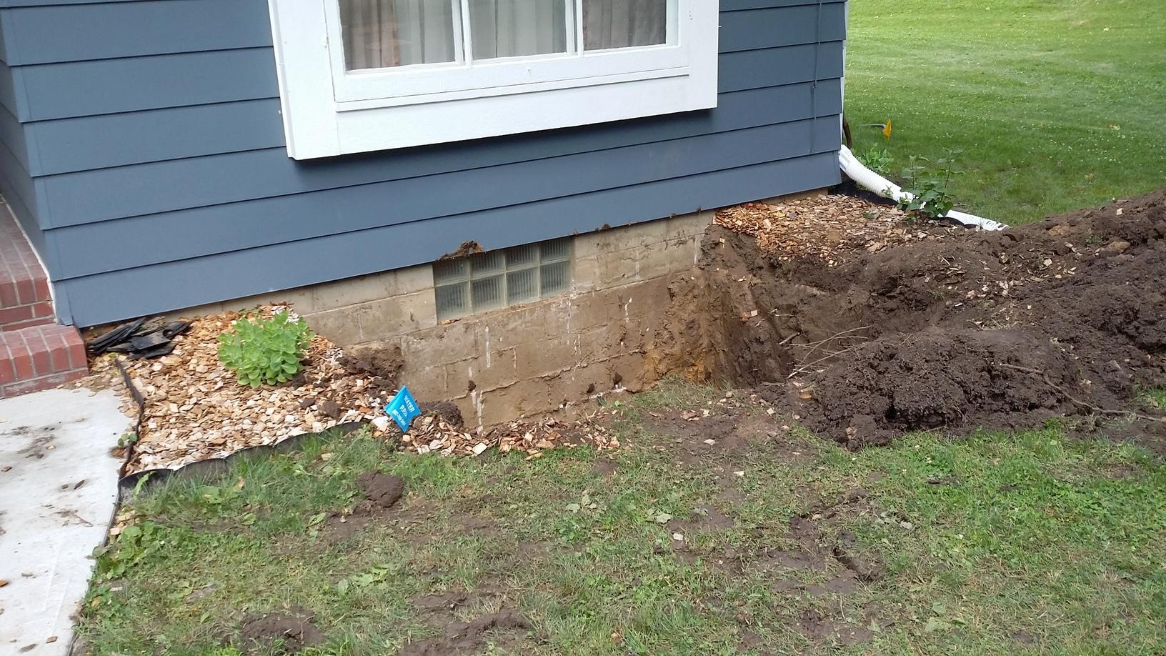 Basement Waterproofing Preston, MN Egress Window Makeover Digging