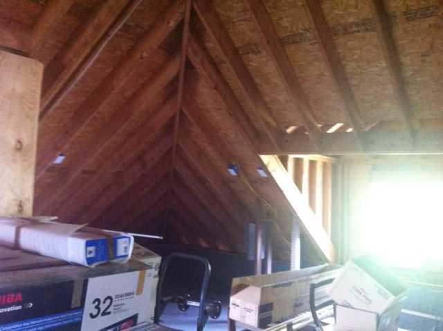 The attic is lacking insulation and air sealing