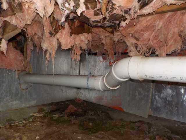 Fallen Insulation and Debris in Crawl Space