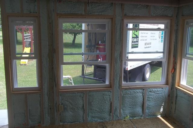 Spray Foam is installed and wall studs shaved leaving the room ready for the installation of sheet rock