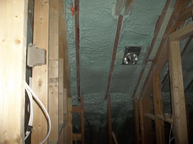 Spray Foam Installed Between Wall Studs and Rafters