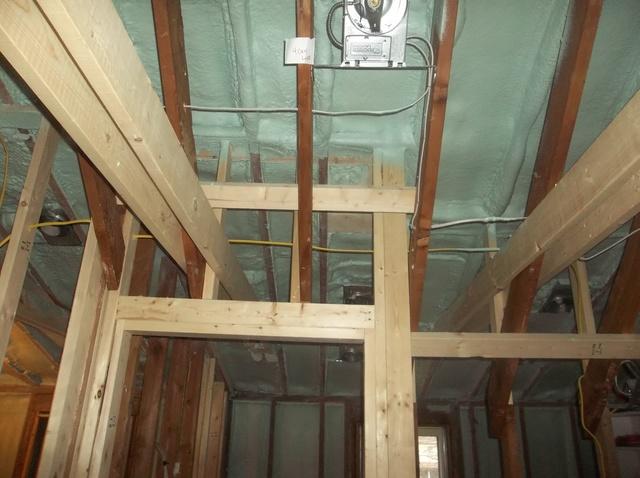 Spray Foam Installed Between Wall Studs and Rafters