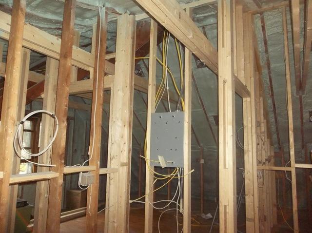 Spray Foam Installed Between Wall Studs and Rafters