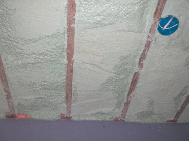 Spray Foam Installed Between Wall Studs and Rafters