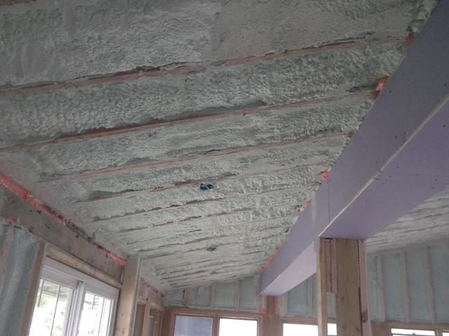 Spray Foam Installed Between Wall Studs and Rafters