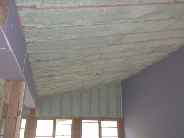 Spray Foam Installed Between Wall Studs and Rafters