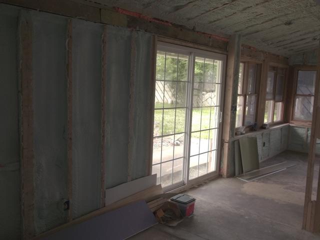 Spray Foam Installed Between Wall Studs and Rafters