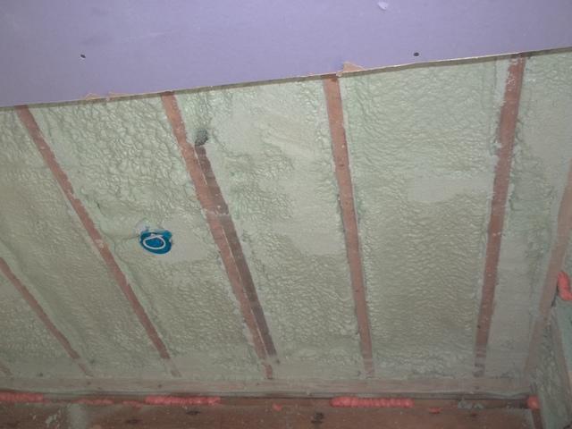 Spray Foam Installed Between Wall Studs and Rafters