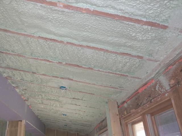 Spray Foam Installed Between Wall Studs and Rafters