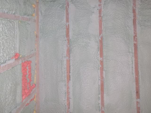 Spray Foam Installed Between Wall Studs and Rafters