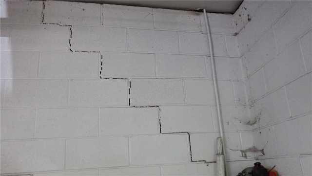 Stairstep Crack Indicates Bowing Wall