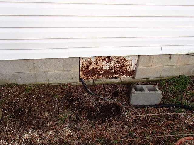 Nasty Crawl Space Door