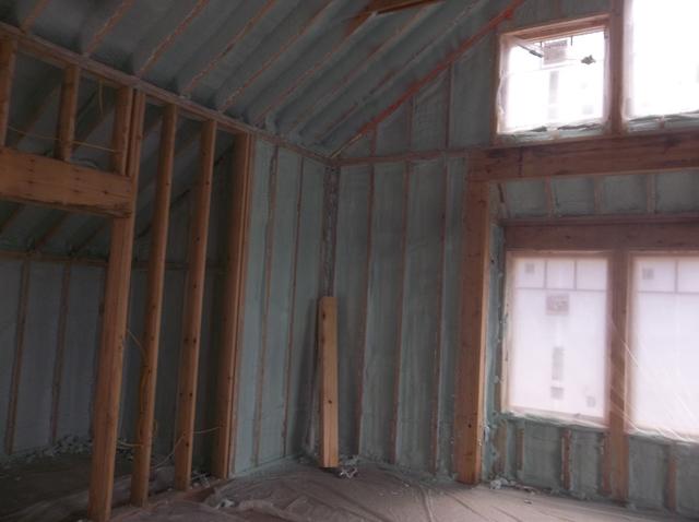 Spray Foam Installed Between Wall Studs and Rafters