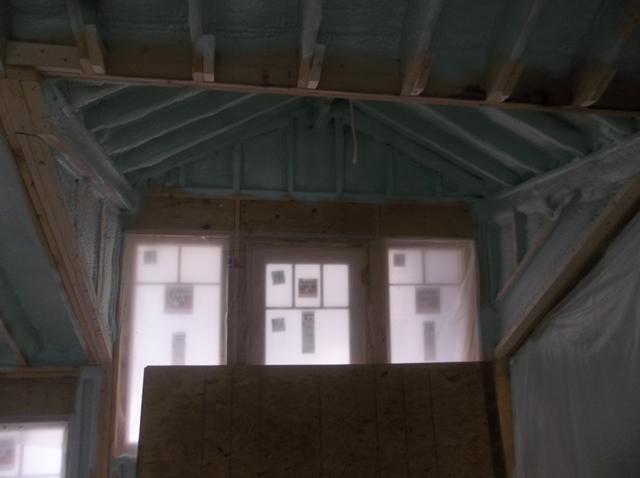 Spray Foam Installed Between Wall Studs and Rafters