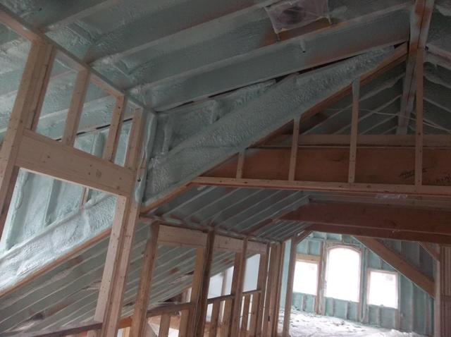 Spray Foam Installed Between Wall Studs and Rafters