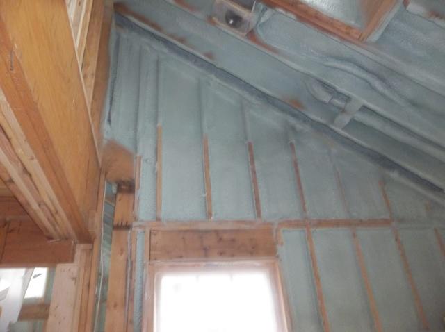 Spray Foam Installed Between Wall Studs and Rafters