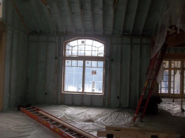 Spray Foam Installed Between Wall Studs and Rafters