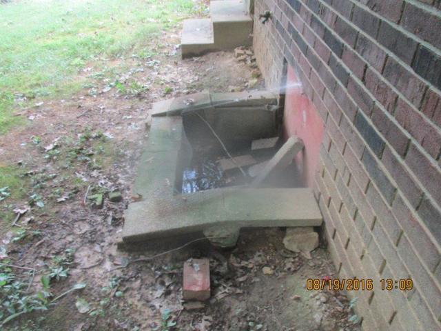 As you can see, this crawlspace access has seen better days.  It's falling apart and worst yet, letting moisture and other nasty stuff in!