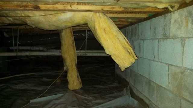 Hanging insulation in the crawlspace