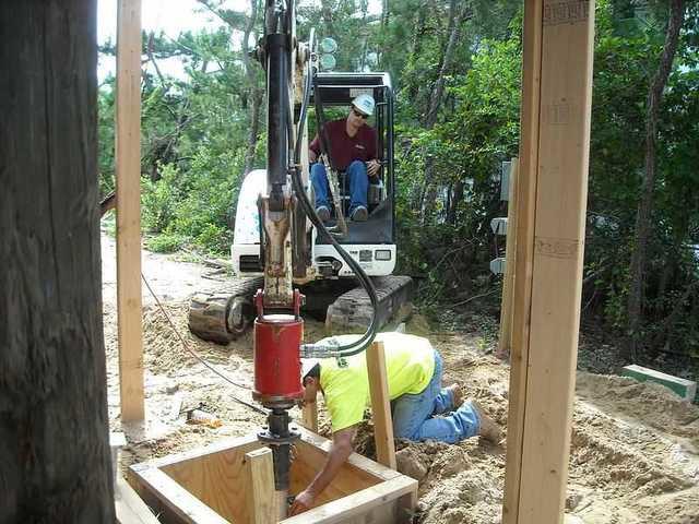Checking that the piers are going in straight