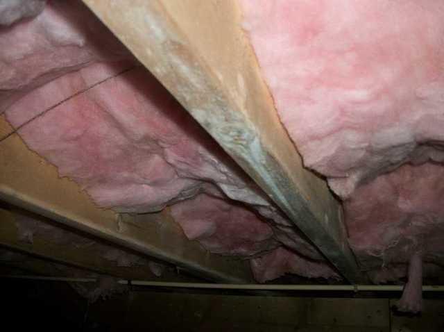 More spotty wood and dirty insulation