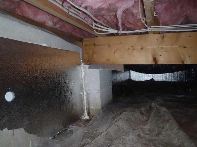 Adding SilverGlo insulation to the crawl space walls