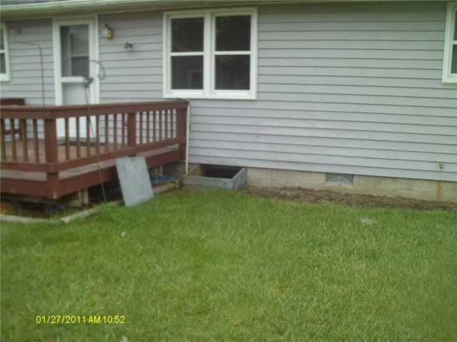 Next to the access door, you can clearly see the dreaded crawl space vent. These things are outdated and cause a world of problems in crawl spaces by letting in water, wind, and debris.