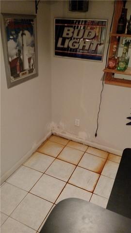 Water Damage Stains Floor Tiles