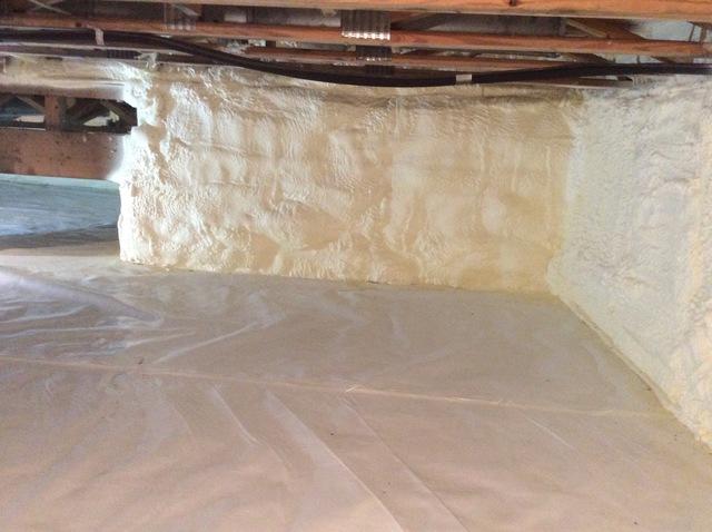 Air seal and insulate crawl space by installing approximately 2" Closed cell spray foam on exterior walls and rim joist of crawl space