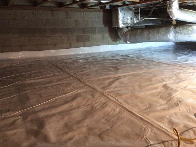 Install 1" TerraBlock insulation matting on floor sealed off with Clean Space vapor barrie