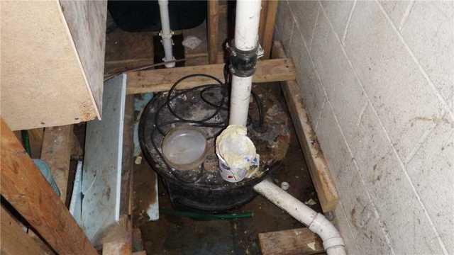 Ineffective Sump Pump in Wet Basement