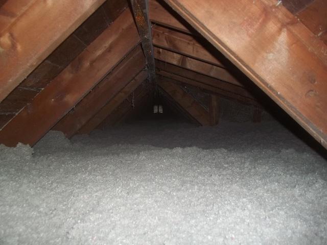 The main attic of this home had the old fiberglass removed and blown Cellulose insulation installed, dramatically increasing the efficiency, comfort, and health of the home and the air inside it.