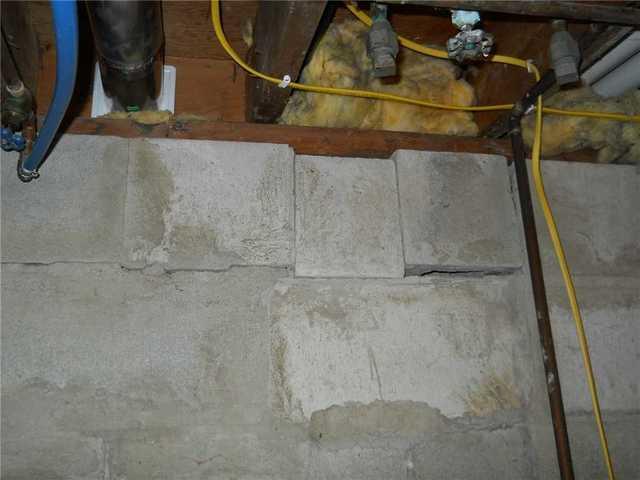 Here you can see the uneven bricks that allow water to enter the basement.