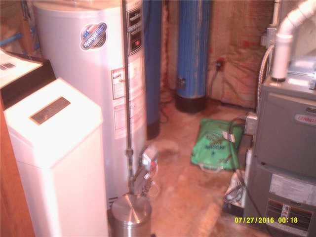 Visible Water Damage on Basement Floor