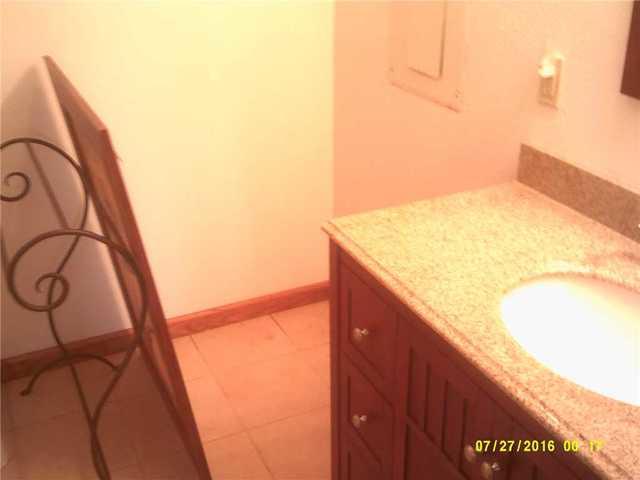 Warped Linoleum in Wet Basement