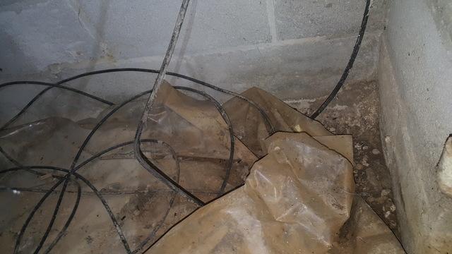 These wires hanging down are at a risk of water damage, or pests (like rodents...yuck) chewing and destroying them. Dirt also contains moisture from the earth that will evaporate, rise and create condensation once the humid air hits a cool air ducts. Where there is humidity and moisture, mold will begin to grow. Yuck!