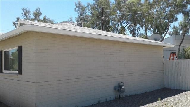 Side of home after gutters installed