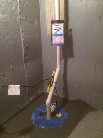 A view of the newly installed SuperSump® sump pump system, completing the new waterproofing system. The homeowner can rest easy now know they have the best solution in place!