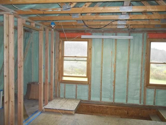 Spray Foam Installed Between Wall Studs and Rafters