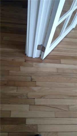 Sagging floors underneath the door